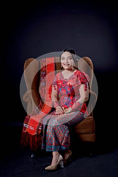 Portrait of beautiful indonesian women wearing traditional batak costume