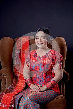 Portrait of beautiful indonesian women wearing traditional batak costume