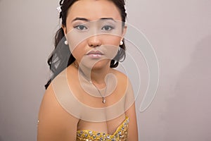Portrait of beautiful kazakh woman looking at camera isolated on whiteâ€“ stock image