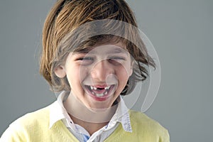 Portrait of a beautiful kid laughing isolated