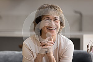 Portrait of beautiful laughing old mature retired woman.