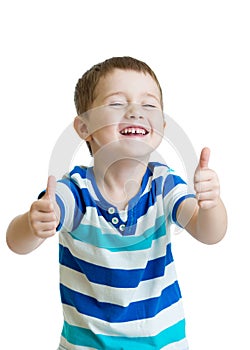 Portrait of beautiful little boy giving you thumbs up over white background