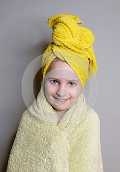 Portrait of beautiful little girl after shower photo