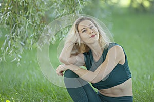 Beautiful Young Woman Relaxing outdoors photo