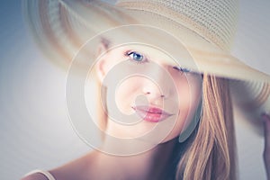 Portrait of beautiful model in hat ,isolated on white background