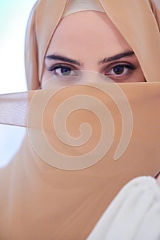 Portrait of beautiful muslim woman in fashionable dress