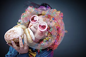 Portrait of beautiful party woman in wig and glasses Carneval