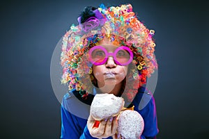 Portrait of beautiful party woman in wig and glasses Carneval