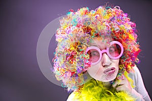 Portrait of beautiful party woman in wig and glasses Carneval