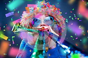 Portrait of beautiful party woman in wig and glasses Carneval