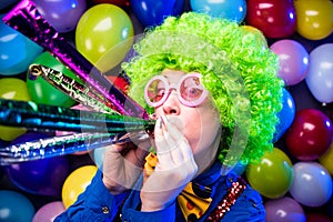 Portrait of beautiful party woman in wig and glasses Carneval