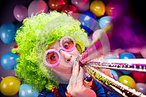 Portrait of beautiful party woman in wig and glasses Carneval