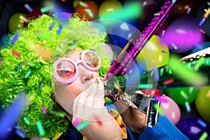 Portrait of beautiful party woman in wig and glasses Carneval