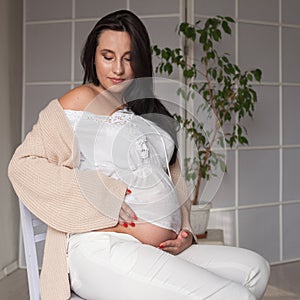 Portrait of beautiful pregnant woman before childbirth family