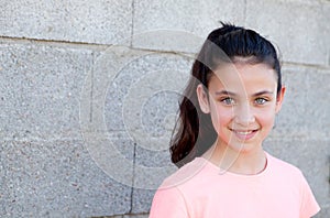 Portrait of a beautiful preteen girl with blue eyes