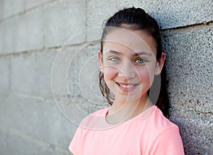 Portrait of a beautiful preteen girl with blue eyes