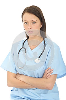 Portrait Of A Beautiful Professional Serious Concerned Young Female Doctor