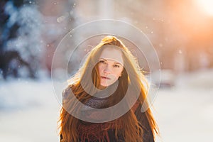 Portrait beautiful redhair girl in frosty winter weather. photo