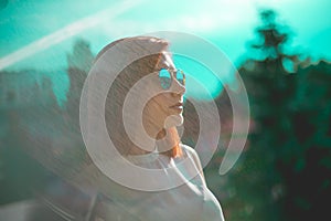 Portrait of beautiful redhair woman wearing glasses