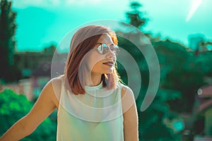 Portrait of beautiful redhair woman wearing glasses