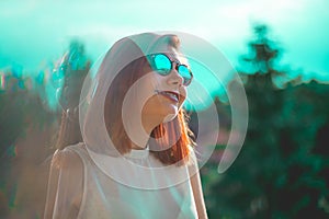 Portrait of beautiful redhair woman wearing glasses