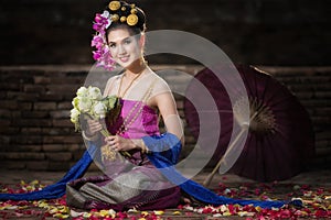 Portrait of Beautiful rural thai woman wear thai dress in Chiang Mai, Thailand