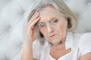 Portrait of a beautiful sad elderly woman