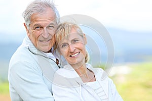 Portrait of beautiful senior couple outdoors