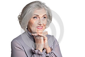 Portrait of beautiful senior woman on white background