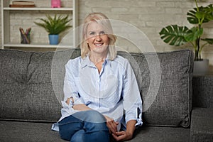 Portrait of beautiful senior woman with white hair is smiling