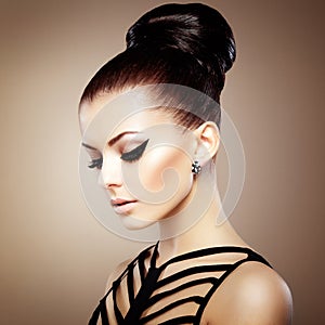 Portrait of beautiful sensual woman with elegant hairstyle. Per