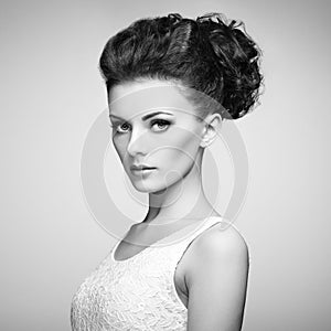 Portrait of beautiful sensual woman with elegant hairstyle. Per