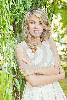 Portrait of a beautiful girl with large plump lips with white hair and a white full long finger