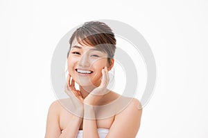 Portrait of Beautiful Skin care woman enjoy and happy, touching her face,isolated with clipping path