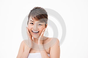 Portrait of Beautiful Skin care woman enjoy and happy, touching her face,isolated with clipping path