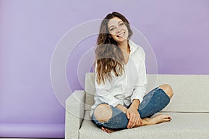 Portrait of a beautiful slender woman with a smile