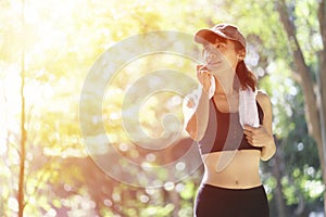 Portrait of beautiful smile healthy asian woman in the park