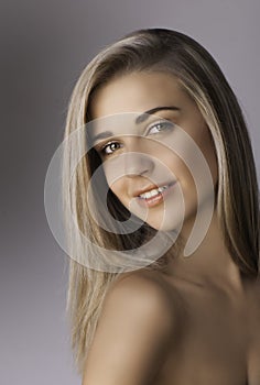 Portrait of beautiful smiling blonde woman photo