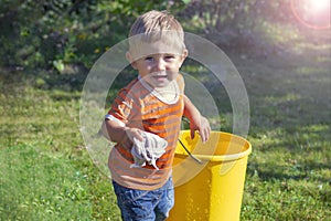 Portrait of a beautiful smiling child on a sunny summer day