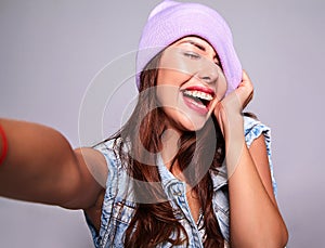 Model in casual summer clothes with no makeup in studio