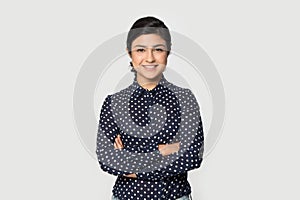 Portrait beautiful smiling Indian girl with arms crossed