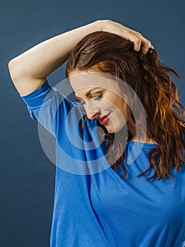 Portrait of a beautiful smiling redhead