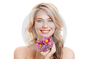 Portrait Of Beautiful Smiling Woman With Flowers. Clear Skin. photo