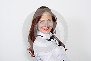 Portrait of a beautiful smiling woman looking at camera