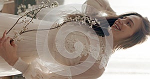 Portrait of beautiful smiling woman with natural flawless skin, wearing vintage style dress. Beauty concept