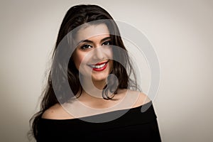 Portrait of a Beautiful Smiling Young Brunette Woman