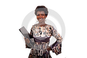 portrait of a beautiful smiling young female student holding laptop