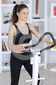 Portrait beautiful sporty young woman doing exercise