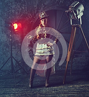 Portrait of a beautiful steampunk woman over vintage background