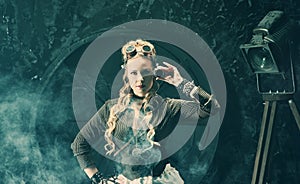 Portrait of a beautiful steampunk woman over vintage background